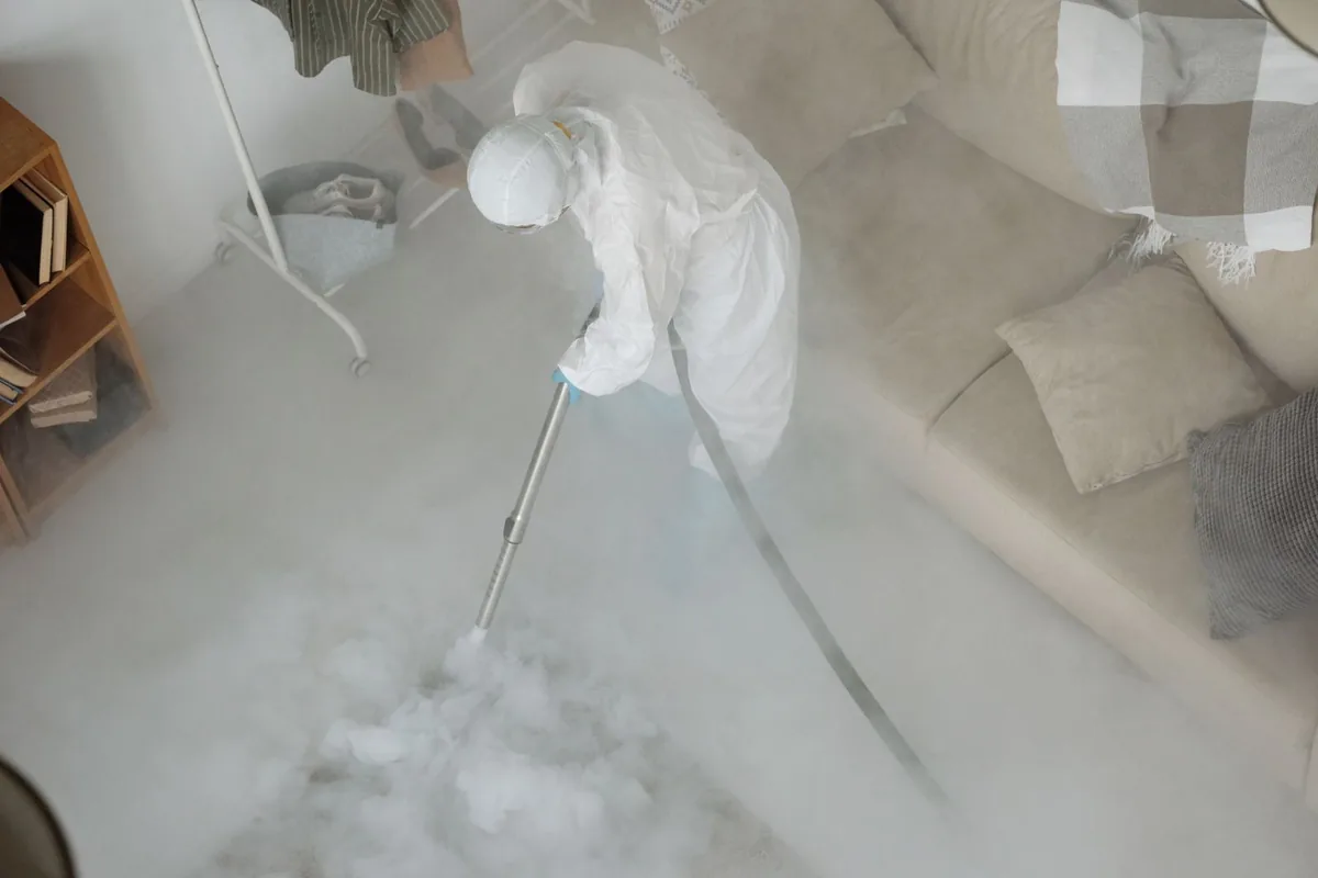 Biohazard cleanup technician in protective equipment, Fox Island, WA